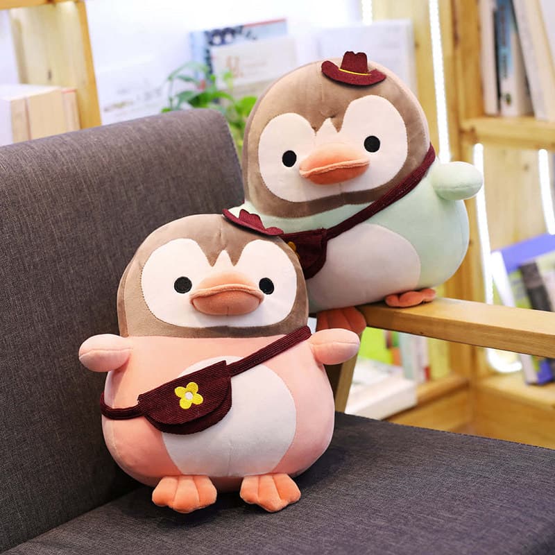 お花のポシェット付きペンギンぬいぐるみ