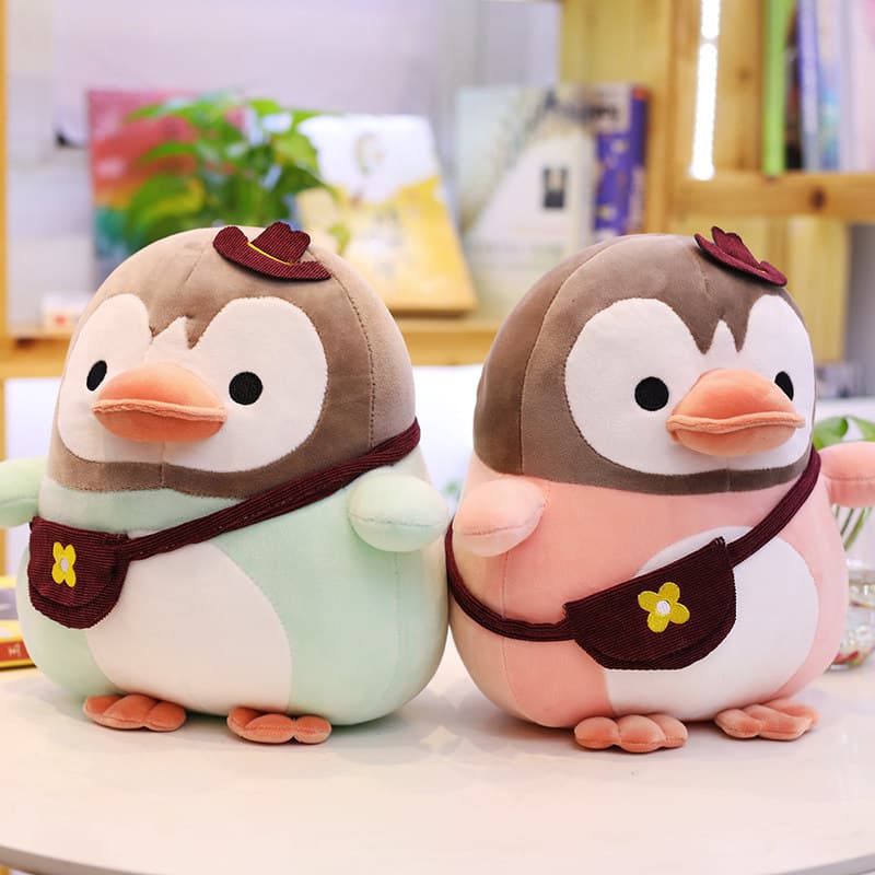 お花のポシェット付きペンギンぬいぐるみ